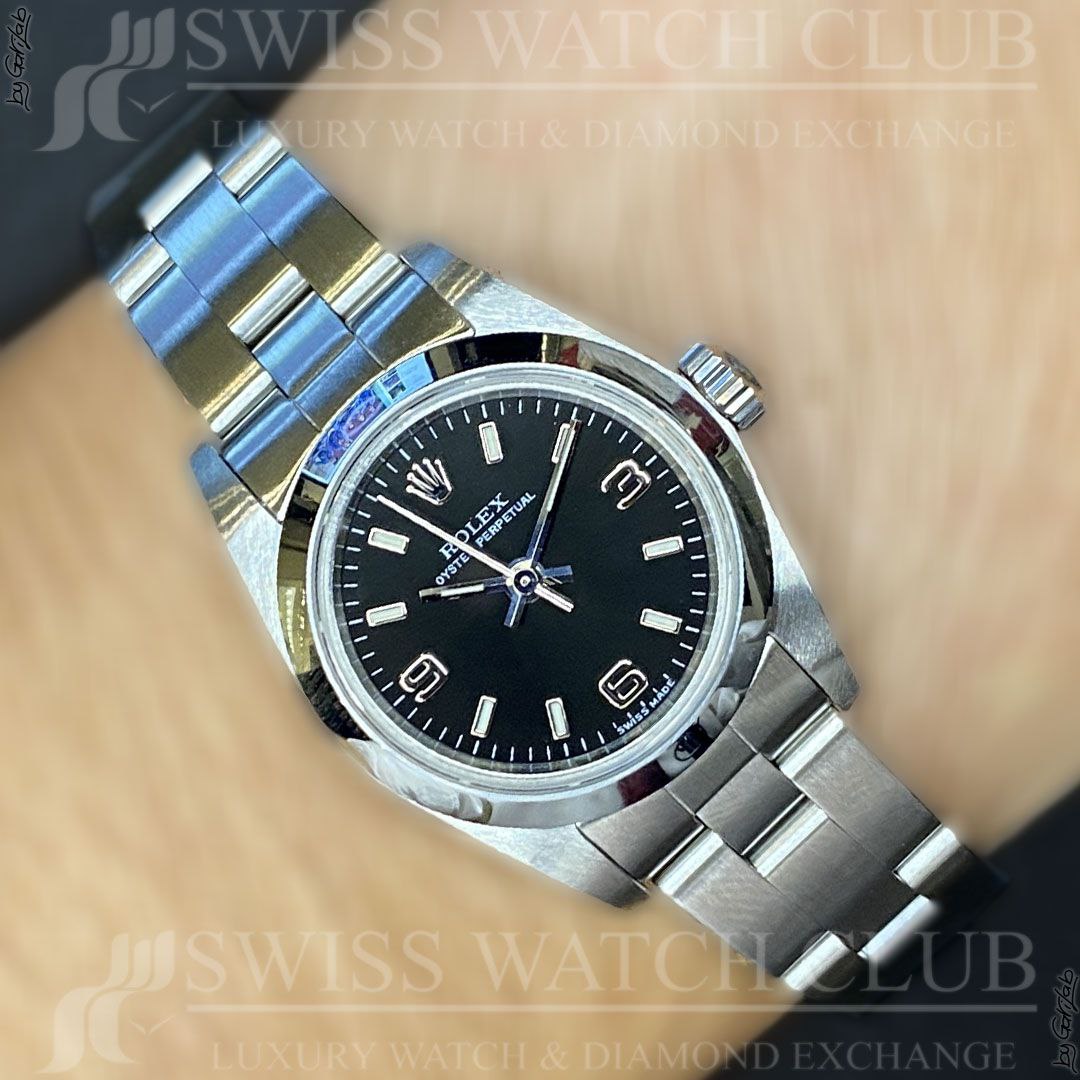 Lignende Sport søn Rolex Oyster Perpetual 24mm 67180 - Swiss Watch Club